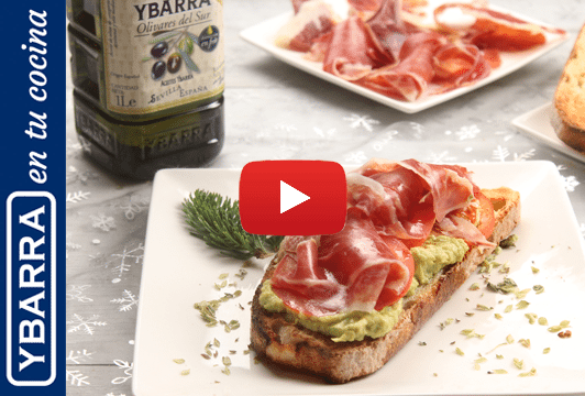 Tosta de aguacate, tomate, jamón y aceite de oliva Virgen Extra Ybarra