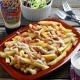 Patatas con queso, bacon y salsa Ranchera